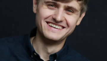 Nikolai Denisov lächelt in die Kamera
